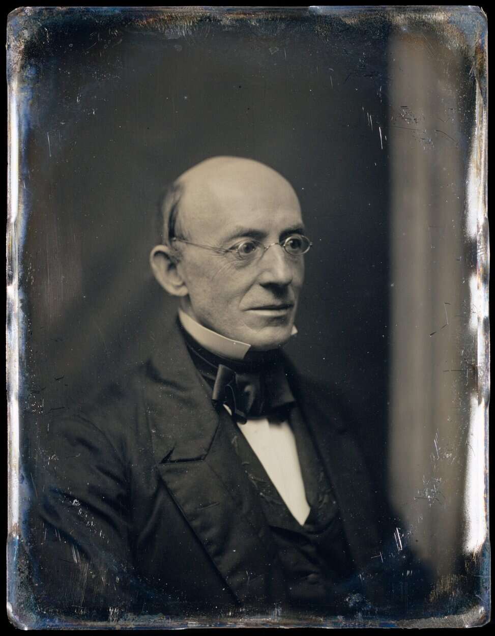 A daguerreotype of William Lloyd Garrison in formal dress.